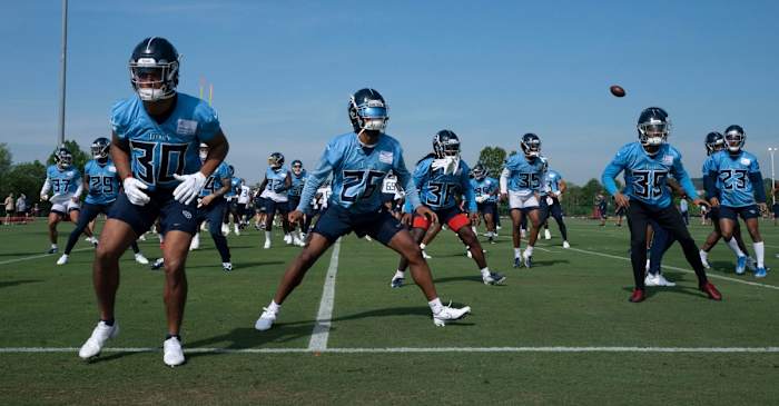 Tennessee Titans warm up during practice at Saint Thomas Sports Park Wednesday, June 1, 2022, in Nashville, Tenn.